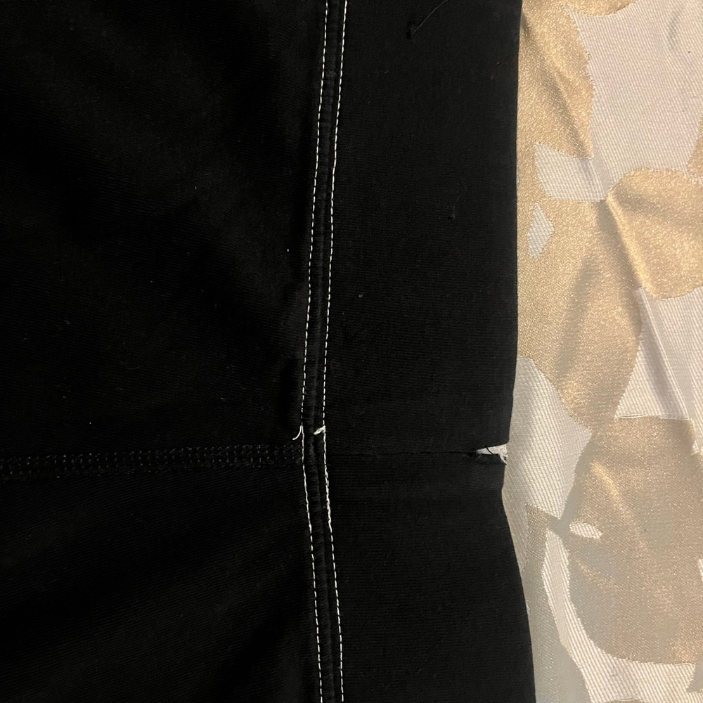 Black with white trimming 
Nike leggings